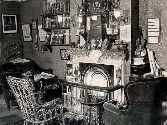 Photograph of the fireplace at 221B Baker Street (1951 exhibition)